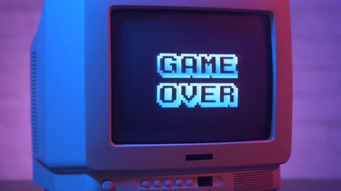 Game Over flashing on a retro video game TV from the 80s or 90s. Vintage CRT screen in a 1980 1990 visual style.