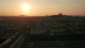 Aerial video of the Sacre Coeur Basilica in Paris France with a beautiful sunset.
