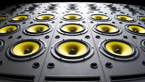 Yellow, vibrant, modern speakers playing, stacked in an endless loop. Powerful membranes in closeup, vibrate in even frequencies suggesting loud, high decibel music. Audiophile electronic equipment.
