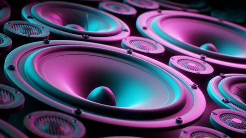 Playing speaker membranes stacked in an endless loop. Lit by colourful and moody retro disco lights. Powerful, modern kind of midrange, subwoofer and twitter loudspeakers vibrate in even, frequencies.