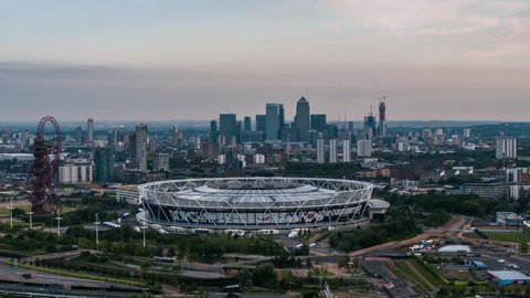 Aerial View of Olympic Stadium, West Ham, London Stadium, in backround Canary Wharf, London Financial District, London, United Kingdom