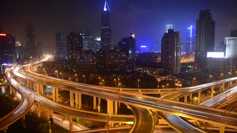 Time Lapse Aerial View of Shanghai Skyline Spectacular Freeway Interchange Night