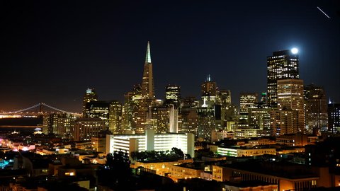 Time Lapse Aerial View of San Francisco City Skyline Office Tower Moonrise Night
