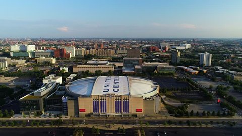 Chicago, IL / United States - August 28, 2018.  This video reveals the United Center - Home of the Chicago Bulls - in the foreground...and the gorgeous skyline views of downtown Chicago. 