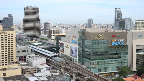 Bangkok,Thailand - Sep 4, 2018 : Aerial View of BTS Sky Train 'Siam' Station In front of Siam Paragon Mall. The trains are coming both 2 railways. In the daytime. Center of Bangkok.