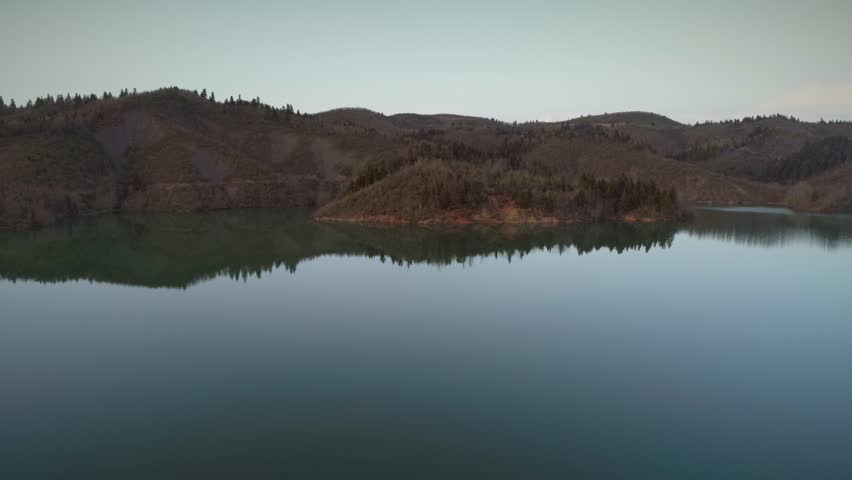 Aerial view of the Plastiras Lake also called Tavropos Reservoir on a cloudy day in Greece.