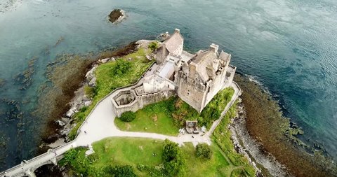 Drone aerial video of the Eilean donan castle and loch duich Highlands Scotland trave