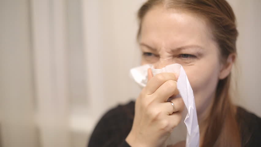 A Sick Middle-aged Woman Sneezes Stock Footage Video (100% Royalty-free ...