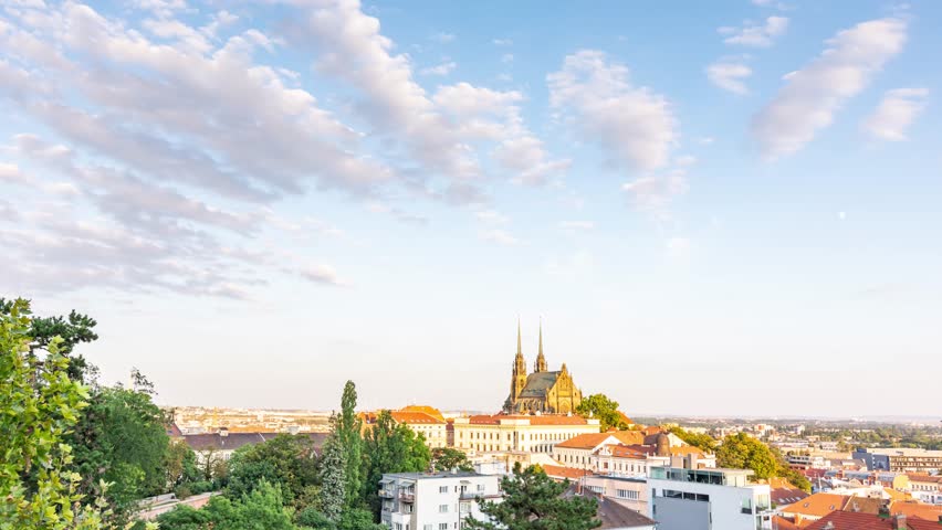 Cathedral St. Peter and Paul, Brno Czech republic. Timelapse video of sunset above the Petrov church. Dynamic clouds, orange and red colors of sunset. Tranquil colors of evening in city.