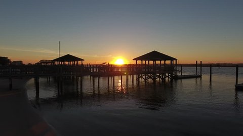 Sunset at a dock in the intracoastal waterway of North Carolina. Stock Video