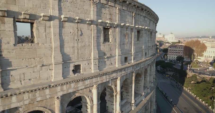 Aerial Drone footage view sunrise of Colosseum in Rome Italy // no video editing