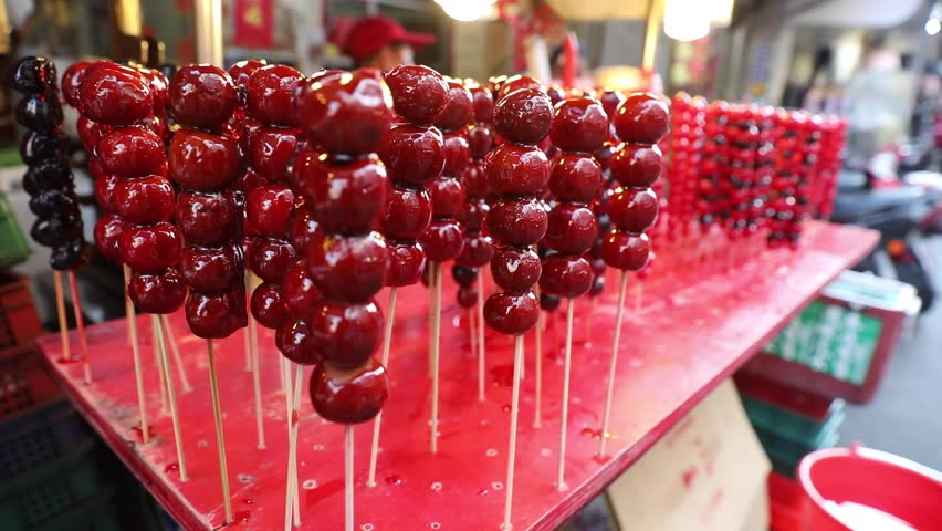 Candied haw in a stick in Taiwan Royalty-Free Stock Footage #1015975597