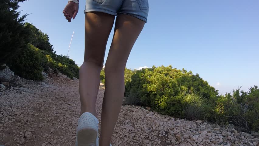 Pretty Girl Hiking Towards Light House at Lefkada