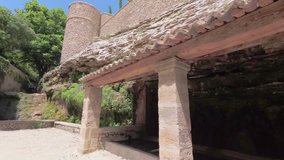 Walking with a video camera in the ancient French town of Gordes. Provence. France. Slow motion.