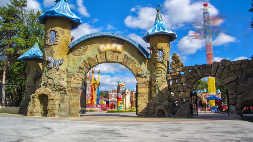 Entrance to Gorky Central Park of Culture and Leisure illuminated at night in Kharkov timelapse, Ukraine