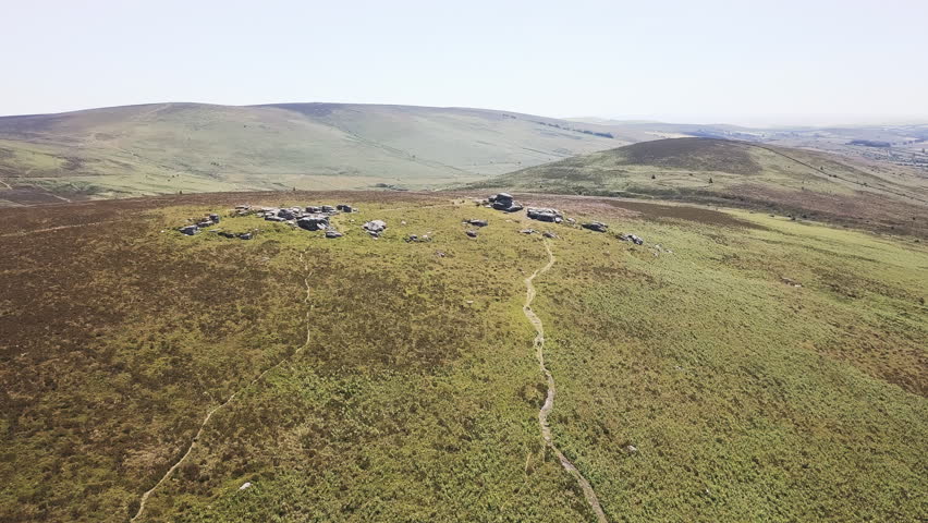 AERIAL drone footage align over desolate moorland