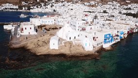 Aerial view video from iconic church of Paraportiani in Little Venice, Chora of Mykonos island, Cyclades, Greece