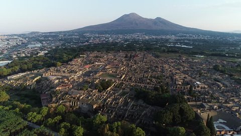 Aerial. Pompeii ruins - ancient lost Roman city. Sunrise. Italy, 4K.