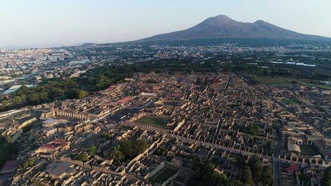 Aerial. Pompeii ruins - ancient lost Roman city. Sunrise. Italy, 4K.