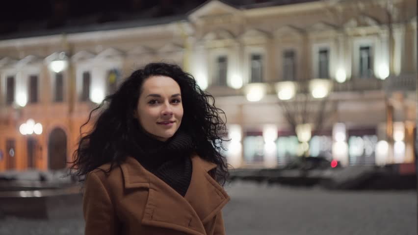 young woman fascinated looking at the night sky