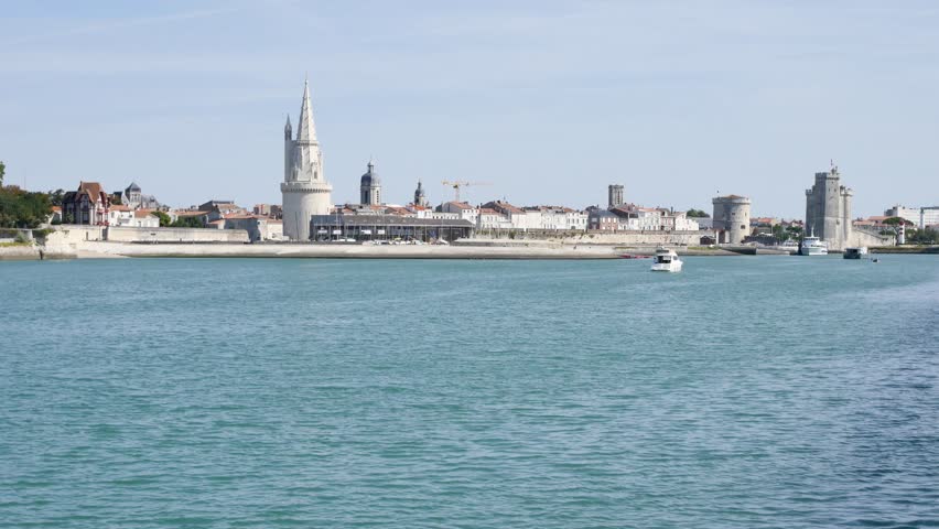 Cityscape of La Rochelle, a town in western France. The lantern tower ("Tour de la Lanterne" in french), on the left, is one of the towers of the old port. 