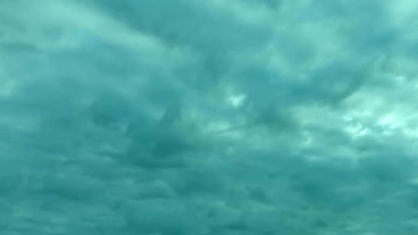 Nice roling clouds time lapse, beautiful rolling, puffy, formating building clouds, dark blue sky in horizon, relaxing day. | Shutterstock HD Video #1016053249