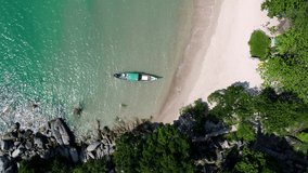 Drone footage. Thailand. Koh Phangan island. Haad yuan beach. Top view aerial video of beauty nature landscape with beach, sea and jungle.