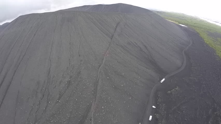 Hverfjall (also known as Hverfell) is a tephra cone or tuff ring volcano in northern Iceland, to the east of M_vatn.