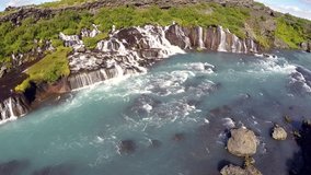 The Hraunfossar waterfalls (Lava Falls) in Borgarfjordur are an exceptionally beautiful and unusual natural phenomena. 