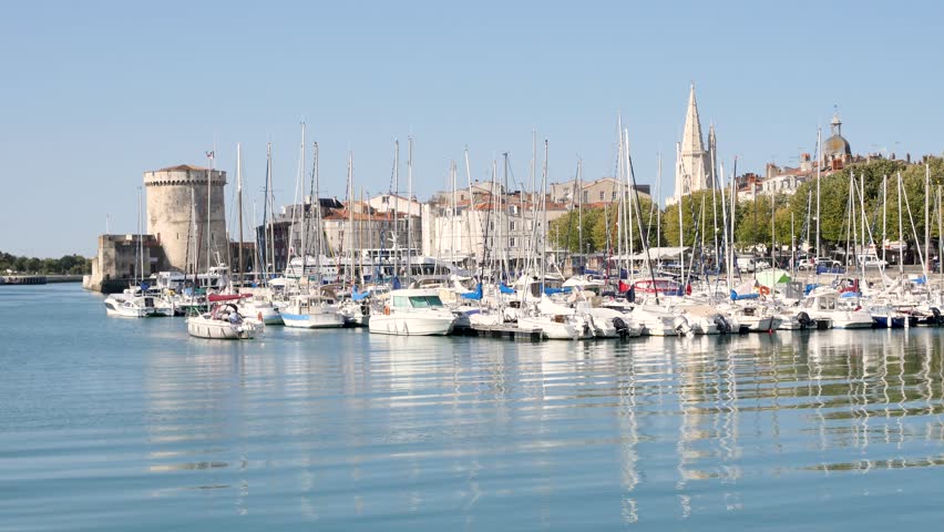 The old port of La Rochelle, a town in western France, located in the Charente-Maritime department. Boats are moored in the city centre. 