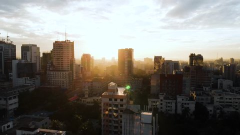 Beautiful aerial drone shot of Dhaka, Bangladesh during a beautiful sunrise as the city is waking up.