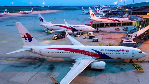 Kuala Lumpur, Malaysia - 8 Aug 2018 : 4k Time Lapse Day to Night Airplane Of Malasia Airlines Transportation In Kuala Lumpur International Airport (KUL) Kuala Lumpur, Malaysia