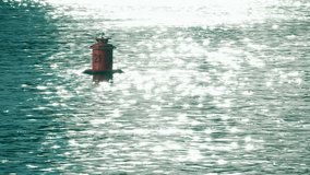 Floating buoy with number 21 on it. Slow motion shot - Powered by Shutterstock - Get 15% off with code: PIKWIZARD15