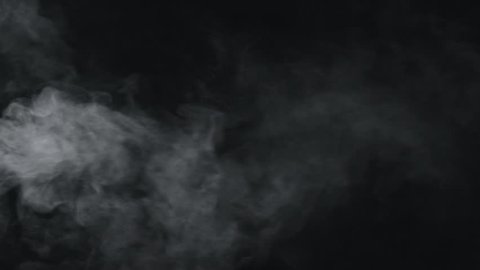 slow motion vapor steam from left side over black background