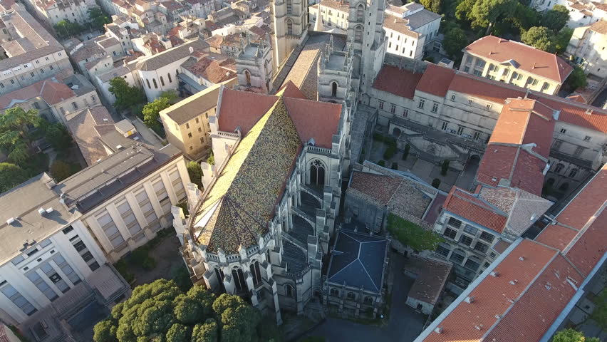 Aerial drone shot of Montpellier cathedral during sunrise.