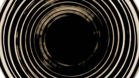 Dark sepia circles spinning in a seamless rotation in a repeating loop with a black background. High definition CGI backdrop motion graphics video clip