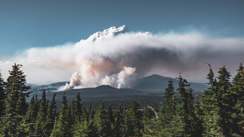 4K Timelapse movie video film of Smoke caused by Large Brush Fire Wide Shot in Oregon, Crater Lake National Park. 4k Video