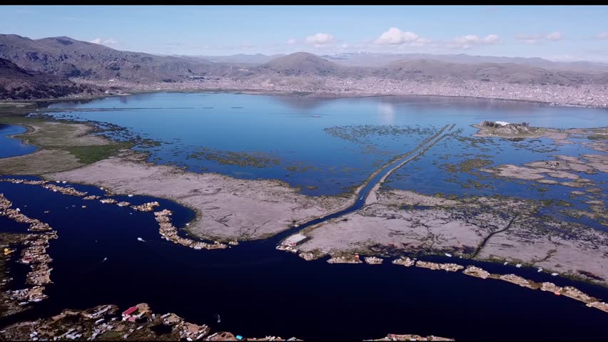 Aerial view of floating islands of Uros at Lake Titicaca near Puno city, Peru