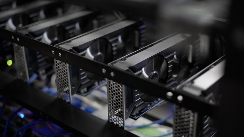 GPU Video Graphics Card mining. Industrial mining farm for bitcoin and cryptocurrency money. Royalty-Free Stock Footage #1016109859
