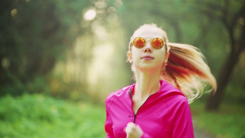 Girl runs through park
