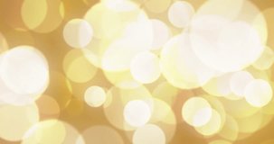 abstract background with animated glowing gold and red bokeh loop