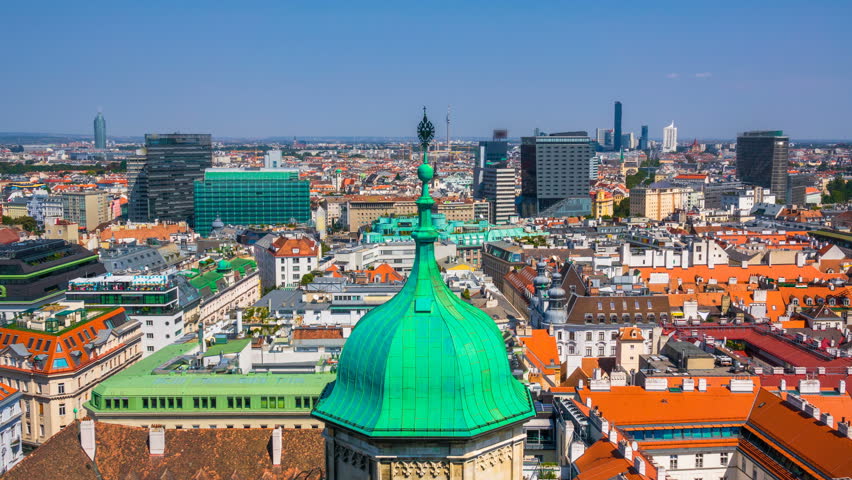 Aerial time lapse of Vienna, Austria  skyline with Peterskirche (St. Peter