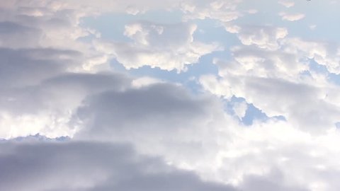 Sunny time lapse clouds, clean blue weather, formating cloudscape fast motion, moving away. Soft real colors, NOT CG. Full HD, 1920x1080, 30 FPS, FHD.