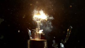 Super slow motion shot of bulb explosion, shooted with high speed cinema camera at 2000 fps. - Powered by Shutterstock - Get 15% off with code: PIKWIZARD15