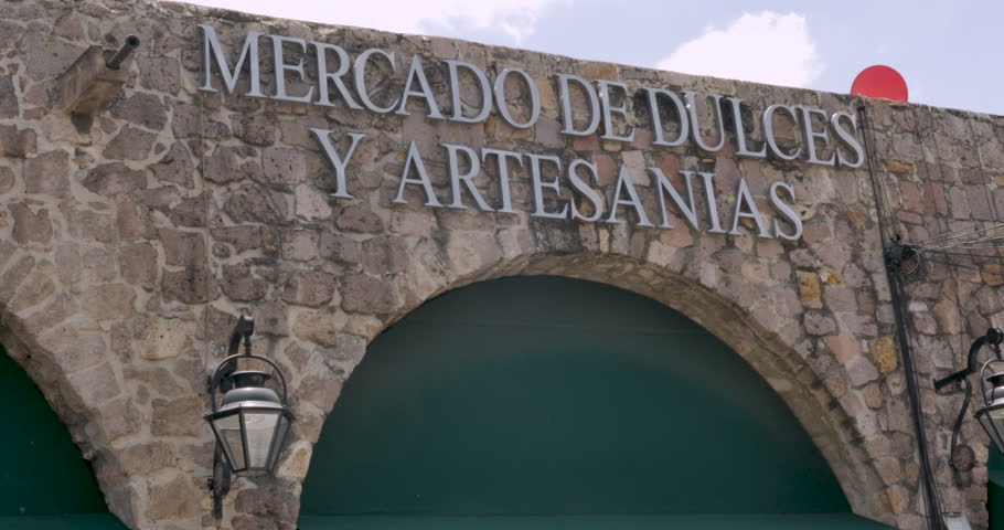 Artisan and sweet market, Mercado de Dulces y Artesanias sign in Morelia, Michoacan, Mexico - Establishing shot