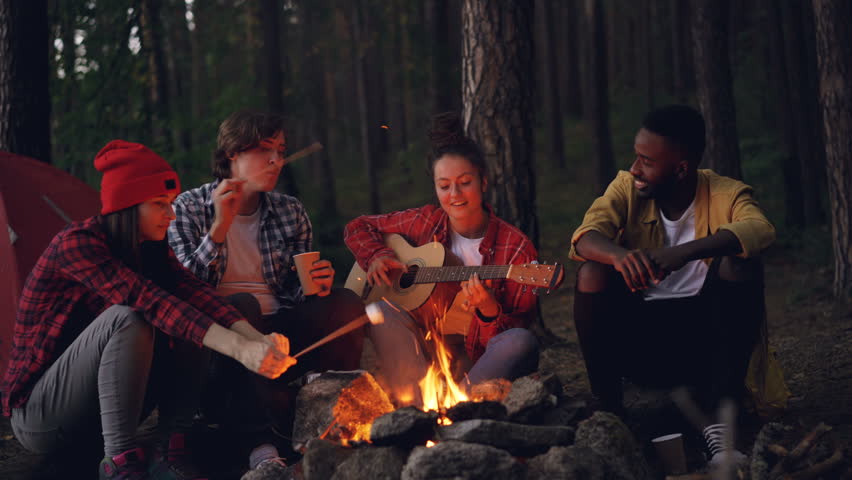 Indians sitting around Fire