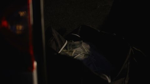 Bag with stolen million dollars hidden in car trunk, bank robbery, break-in