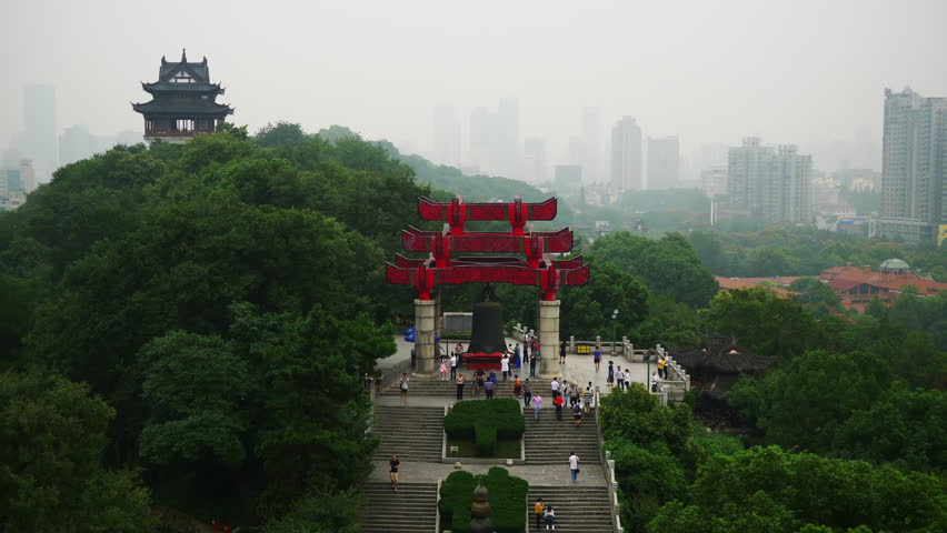 wuhan most famous temple rooftop cityscape bell monument slow motion panorama 4k china