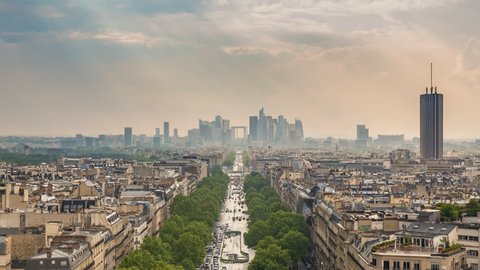 Paris France time lapse 4K, aerial view city skyline timelapse at La Defrense and Champs Elysees street