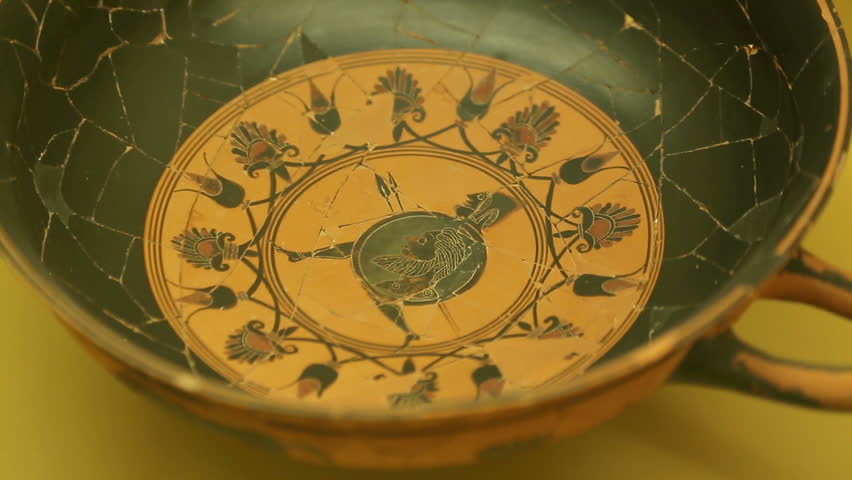 Close-up of ceramic kylix with warrior, ancient Greek pottery at Agora museum